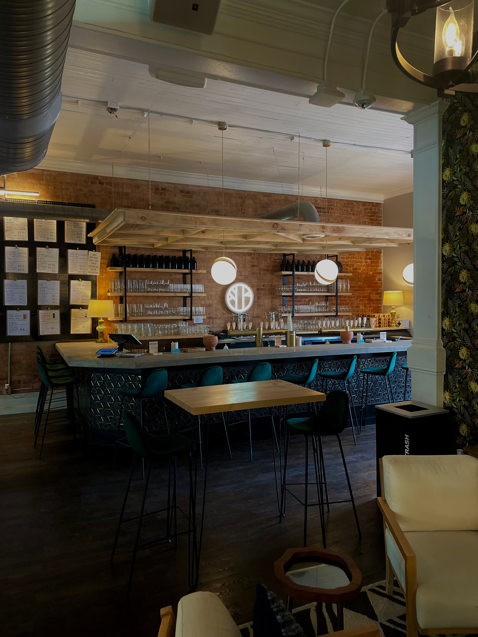 Bar area close-up at Flourish Taproom with warm ambient lighting